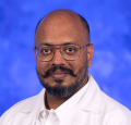 Aum Pathare, MD